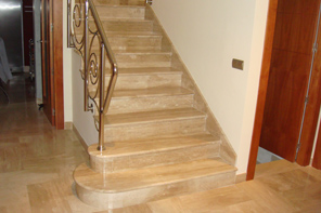 Daino Reale marble staircase with a round trim