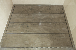 Floating flooring shower tries.