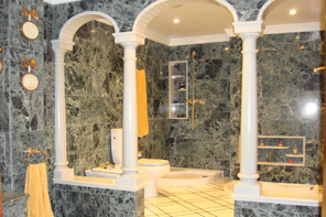 Solid columns to bathroon in White Macael Marble